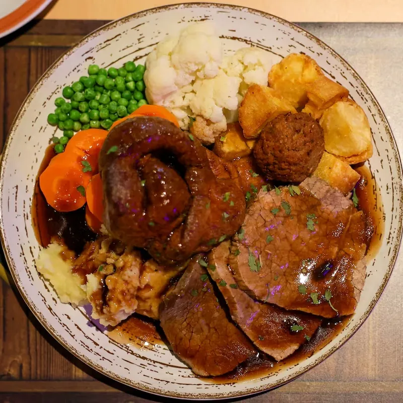 Foto de Carne asada al horno con puré